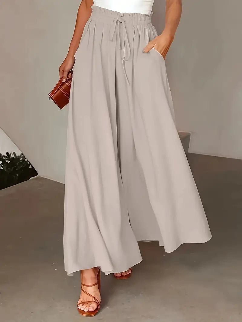 Ladies' culotte pants with elastic waist and embroidered polka dot pattern Lune London