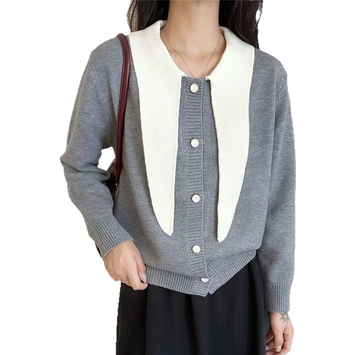 Fashionable women's cardigan with decorative scarf and button details Lune London