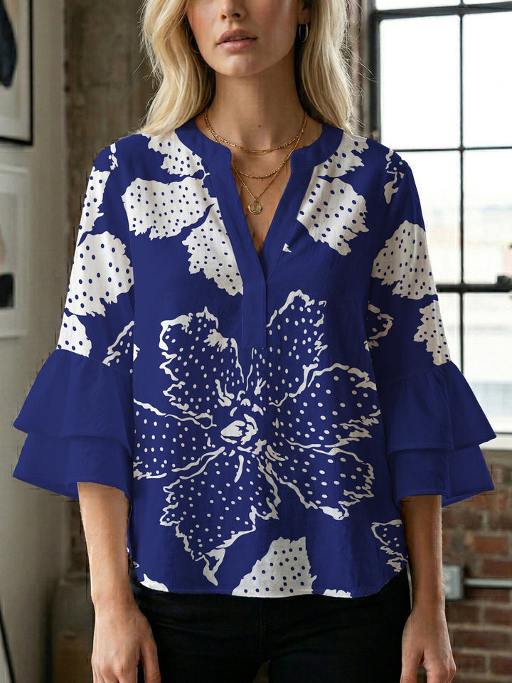Ladies elegant blouse shirt with voluminous puff sleeves and graphic floral design Lune London