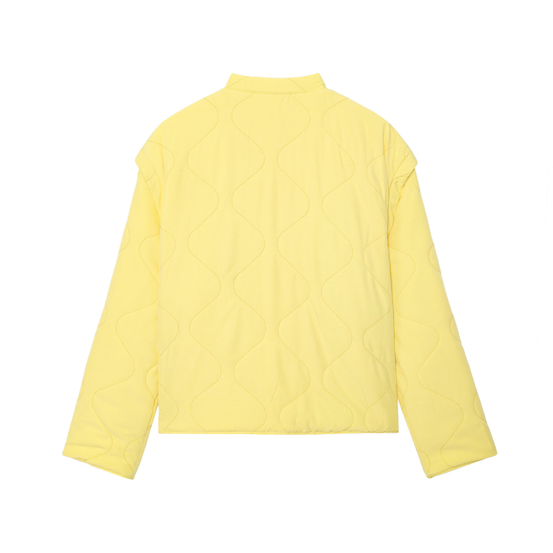 Quilted transition jacket for women with practical button closure and pockets Lune London