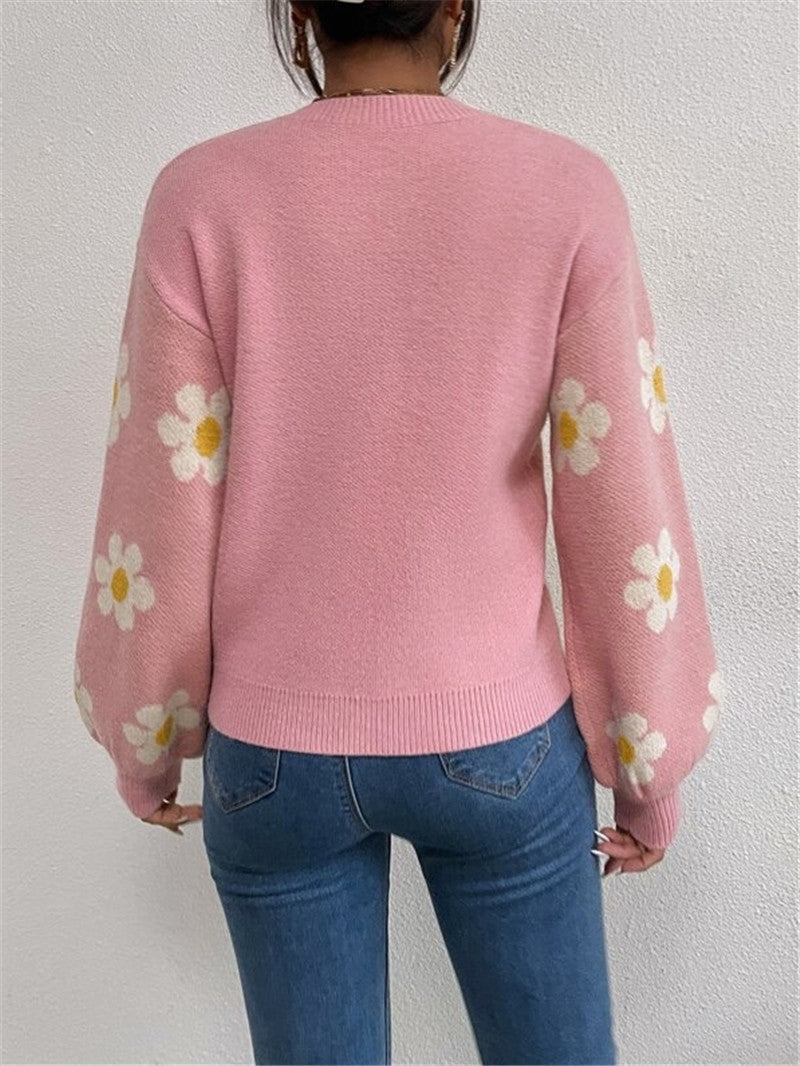 Knit sweater for women with a playful floral pattern and elegant puff sleeves Lune London