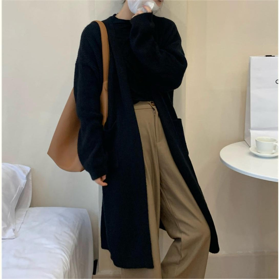 Manteau tricoté pour femmes avec ouvertures et poches spacieuses Chic & Stil