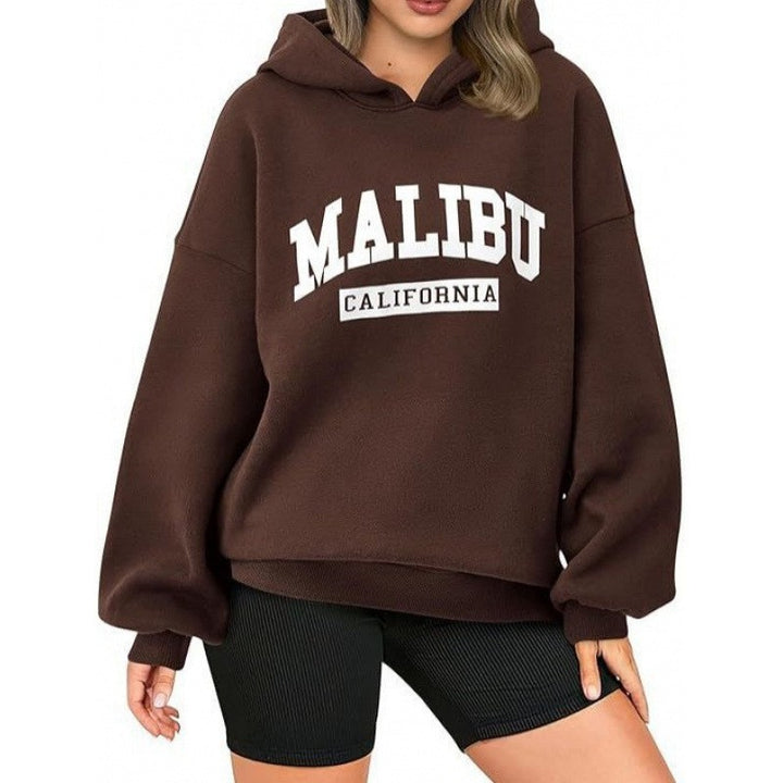 Women's casual hoodie with oversized cut and eye-catching print Chic & Stil