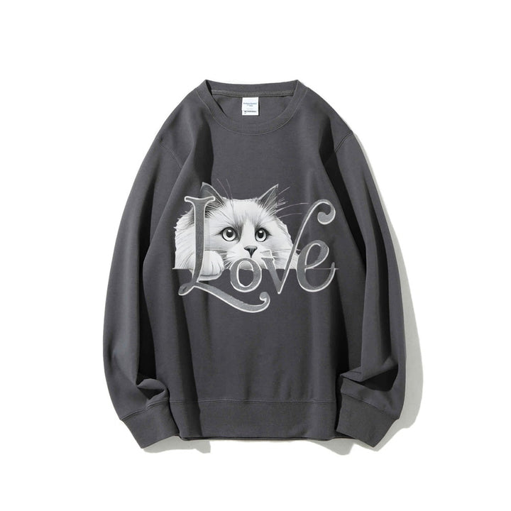 Sweat-shirt pour femmes avec un design de chat ludique et une coupe décontractée Chic & Stil