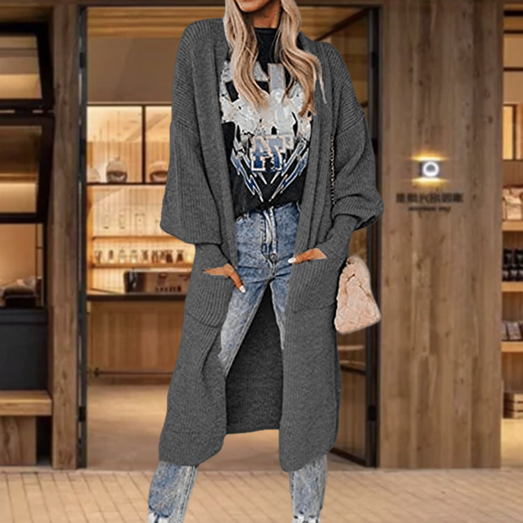 Knitted cardigan for women with wide sleeves and practical inset pockets Lune London