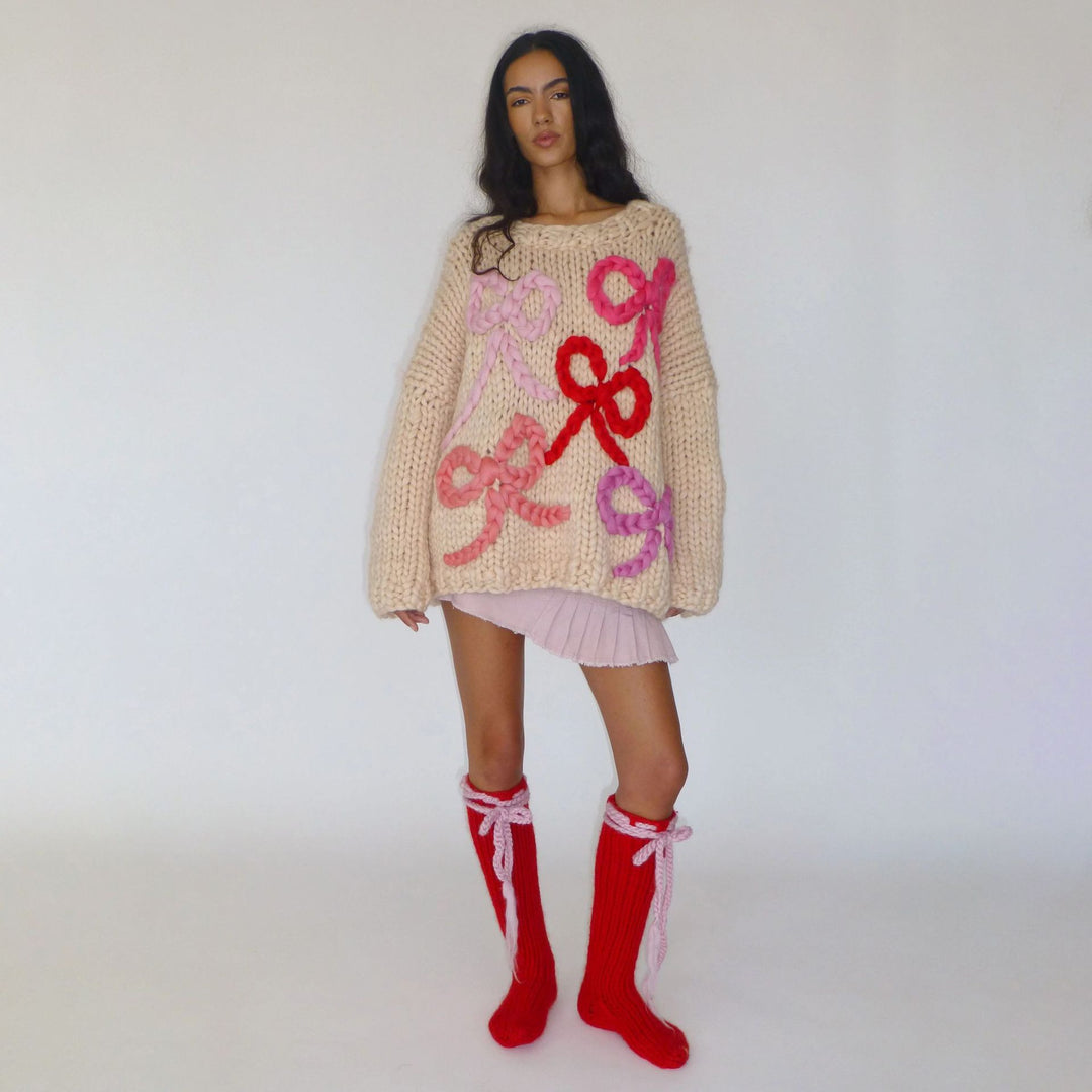 Chunky knit sweater for women with a playful knot design Lune London