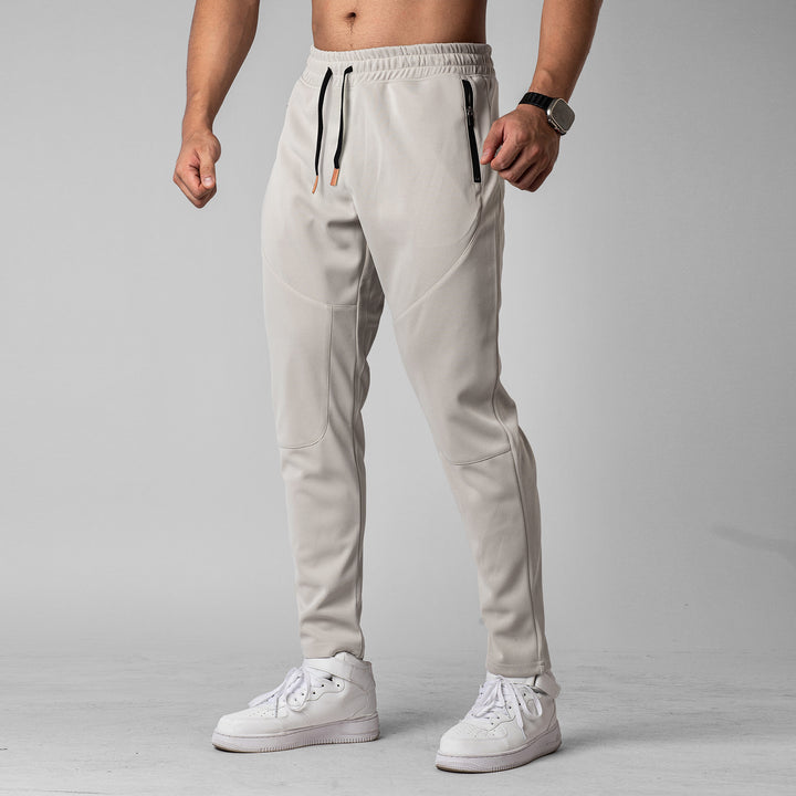 Men's sporty jogging pants with an innovative breathable structure and practical zippered pockets Lune London