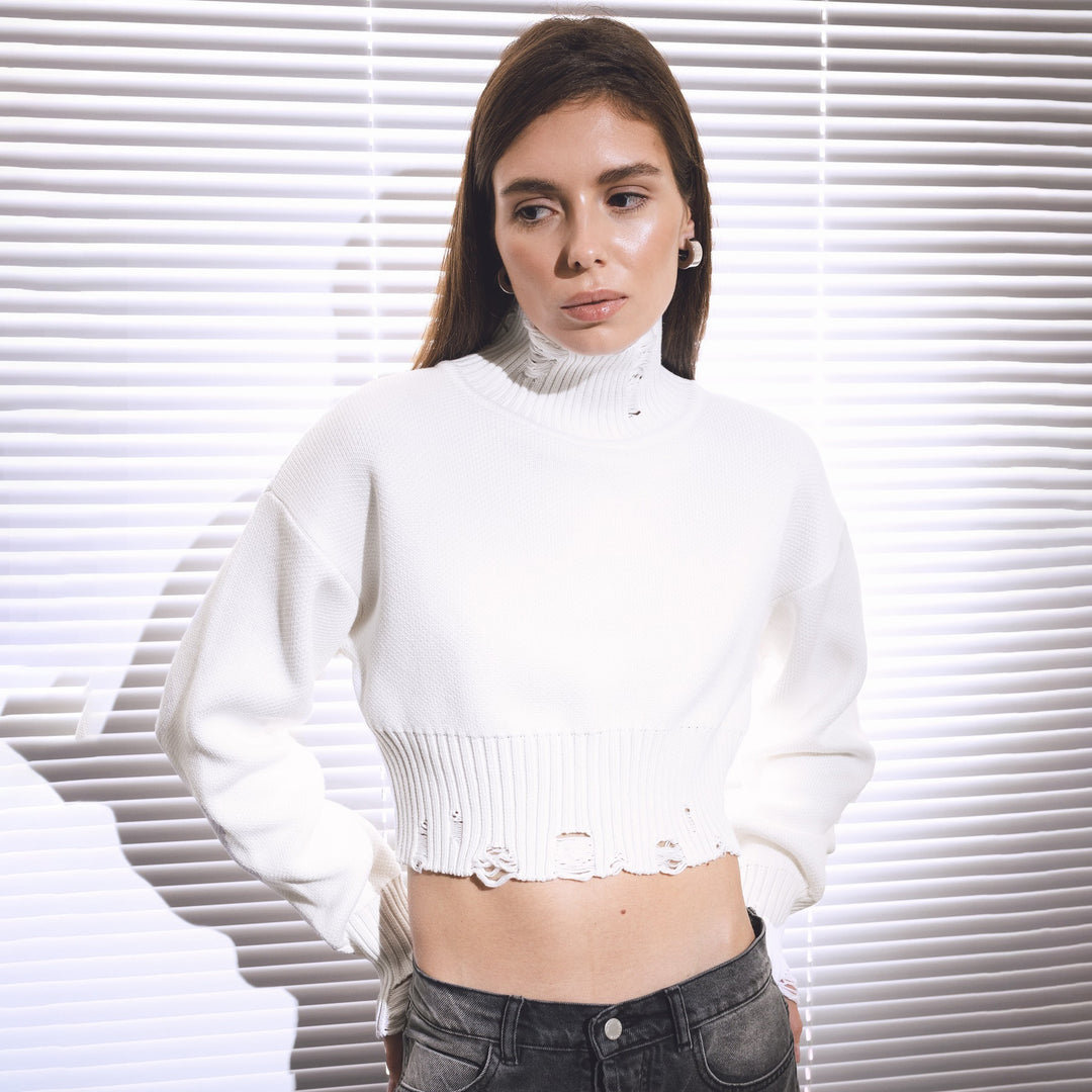 Trendy cropped sweater for women with a modern ribbed design and playful details Lune London