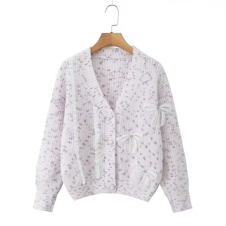 Women's knitted jacket with decorative knots and a delicate pattern Lune London