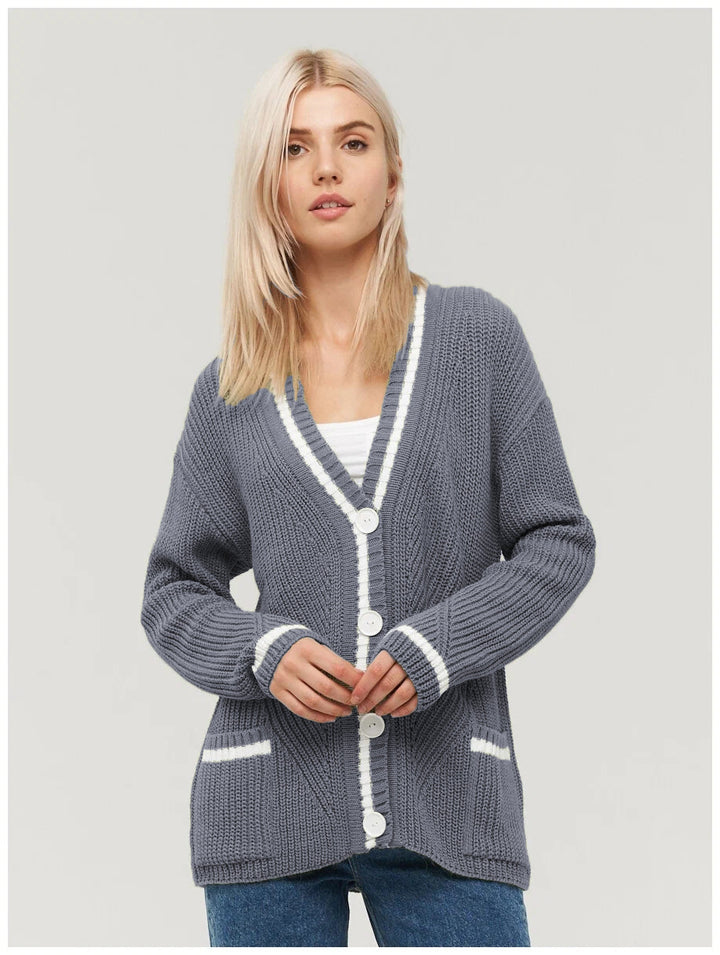 Ladies chunky knitted jacket with practical flap pockets and contrasting details Lune London
