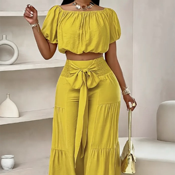 Woman Deep V-Neck Crop Top and High-Waisted Palazzo Pants Lune London