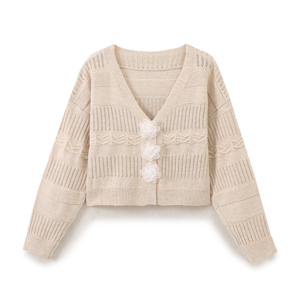 Ladies fashion sweater with romantic floral buttons and casual cut Lune London