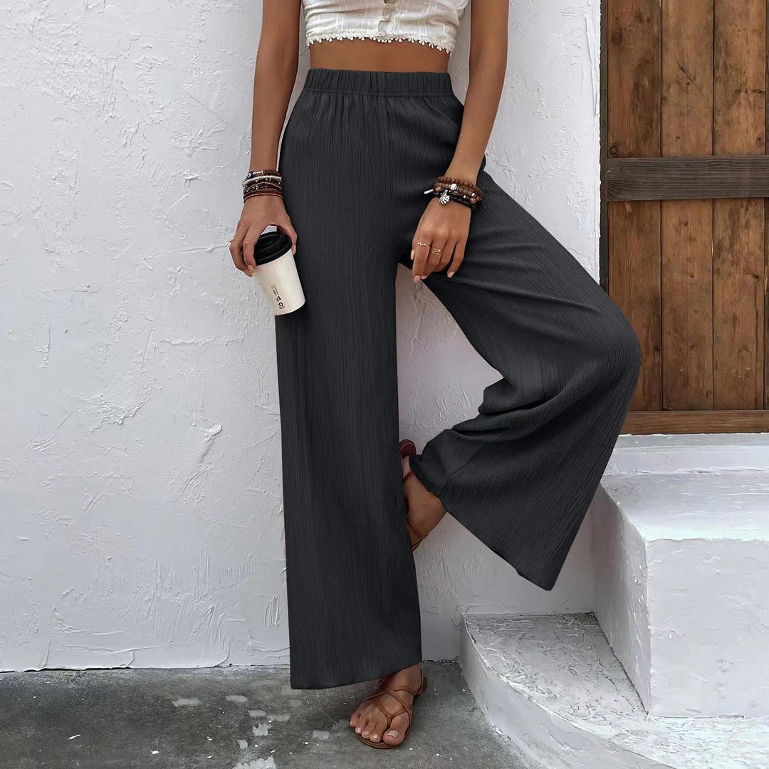 Wide pleated pants for women with elastic waist and elegant drape Lune London