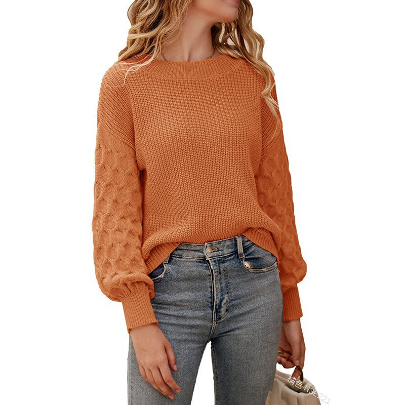 Knitted sweater for women with structured ruffle sleeves and a round neck Lune London