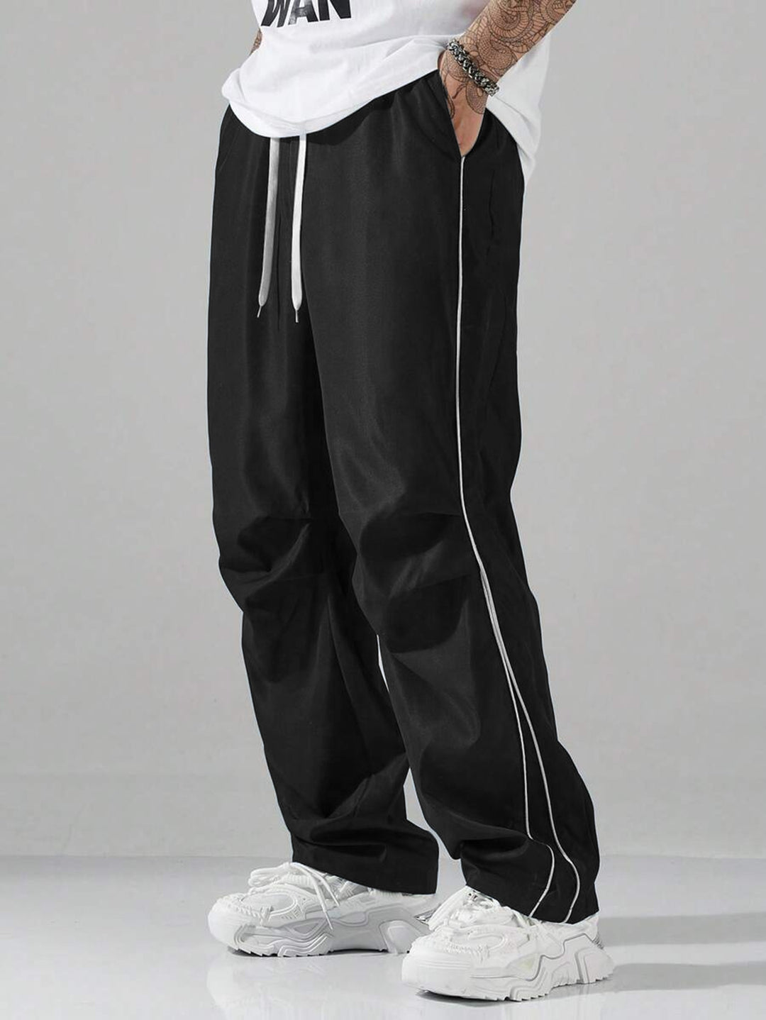 Men's sports pants with elastic waistband and contrasting stripes Lune London