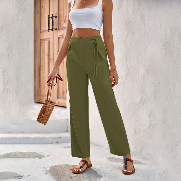 Loose summer pants for women with elastic waistband and tie belt Lune London
