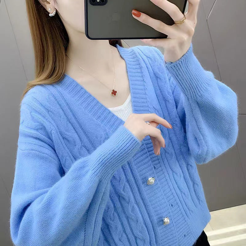 Knitted jacket for women with an elegant braid pattern and high-quality button details Lune London