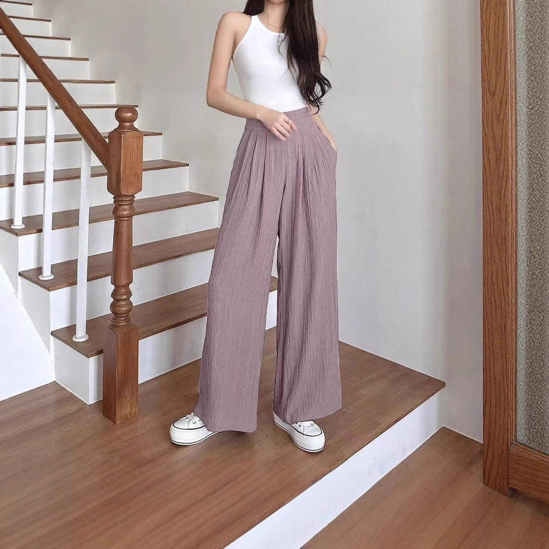 Wide pleated trousers for women with high pockets and elastic waist Lune London