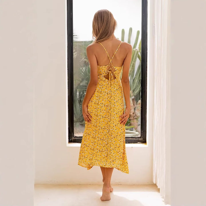 Summer dress for women with a lovely floral print and playful straps Lune London