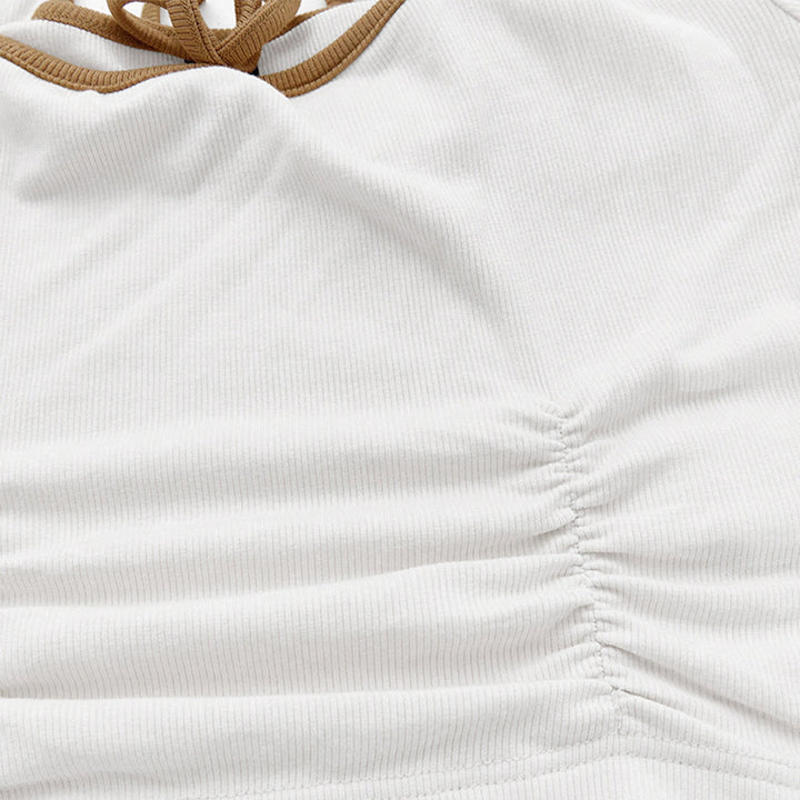 Long sleeve cropped top for women with an elegant square neckline and sophisticated knot details Chic & Stil