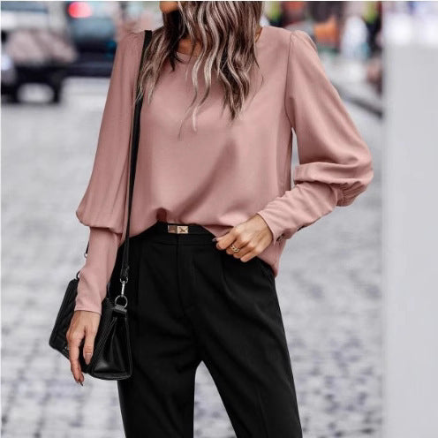 Elegant women's blouse with puff sleeve details and structured fabric Lune London