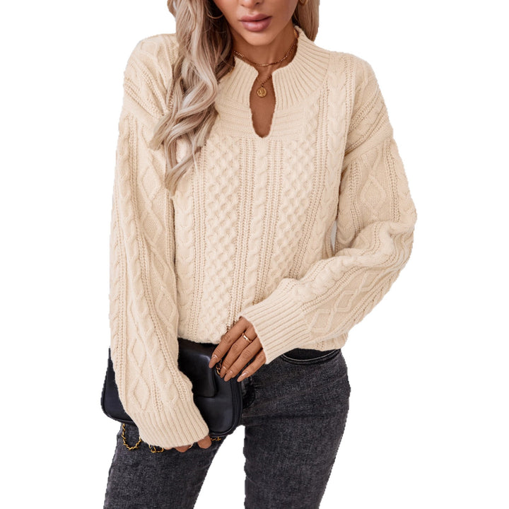 Fashionable women's knitted sweater with a unique cable design and a chic round neck. Lune London