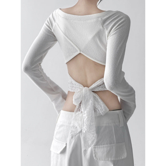 Women's casual long sleeve top with open back and decorative tie belt Chic & Stil