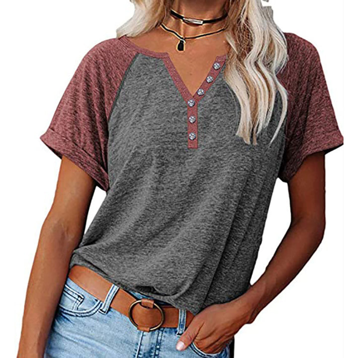 Women's raglan style T-shirt with decorative button details and relaxed fit Lune London