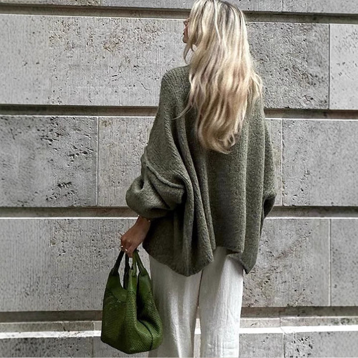 Chunky knit cardigan for women with elegant button details and a relaxed oversized fit Lune London