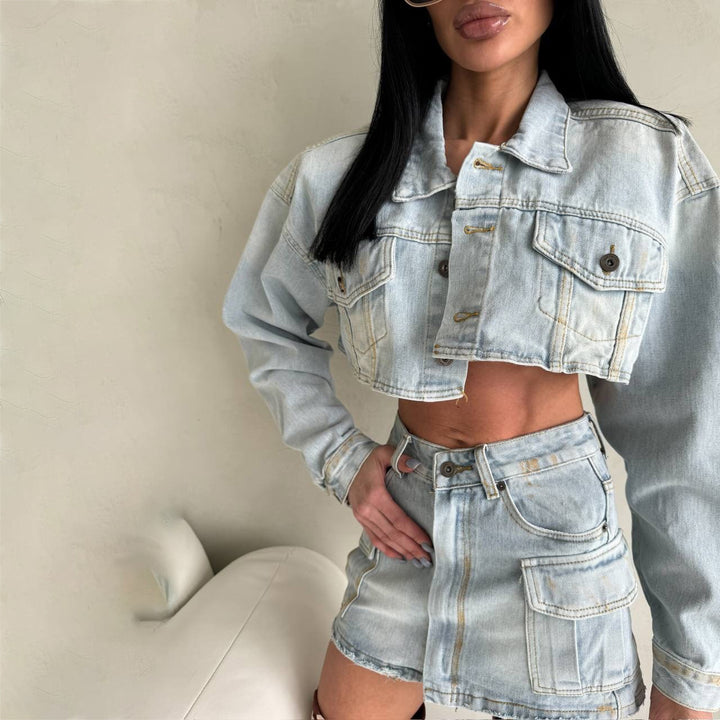 Women's cropped denim jacket with matching mini skirt in a modern utilitarian style Lune London