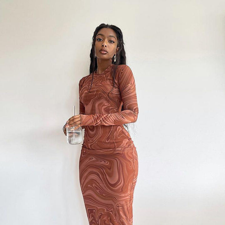 Elegant long-sleeve dress for women with a modern marble pattern and a fitted cut Lune London