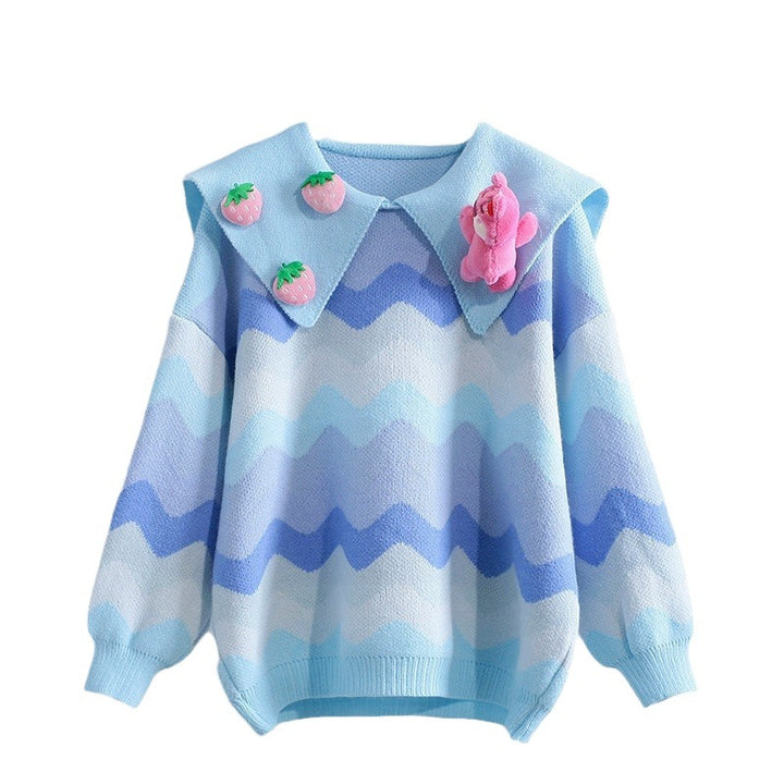 Knitted sweater for women with playful appliqués and a wave pattern Lune London