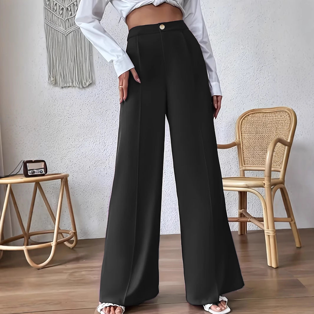Wide palazzo pants for women with a stylish high waist cut and a button detail Lune London