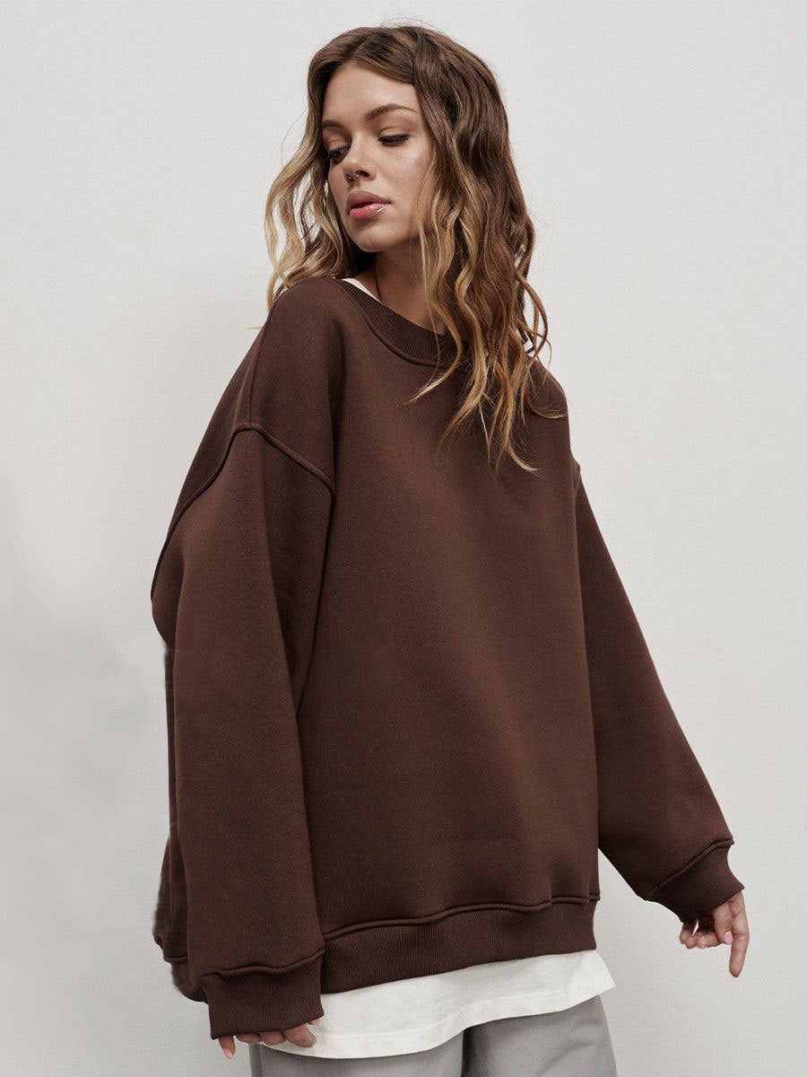 Woman Oversized sweatshirt with a relaxed fit and modern chic accents and style