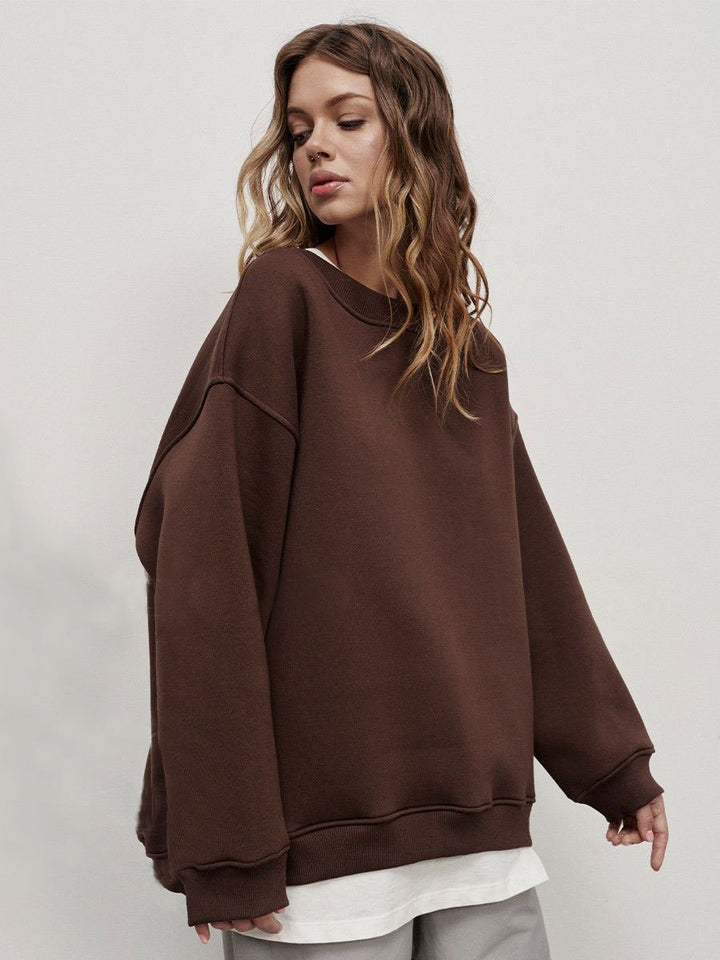 Woman Oversized sweatshirt with a relaxed fit and modern chic accents and style