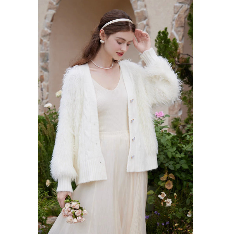 Knitted jacket for women with fluffy sleeves and button closure Lune London