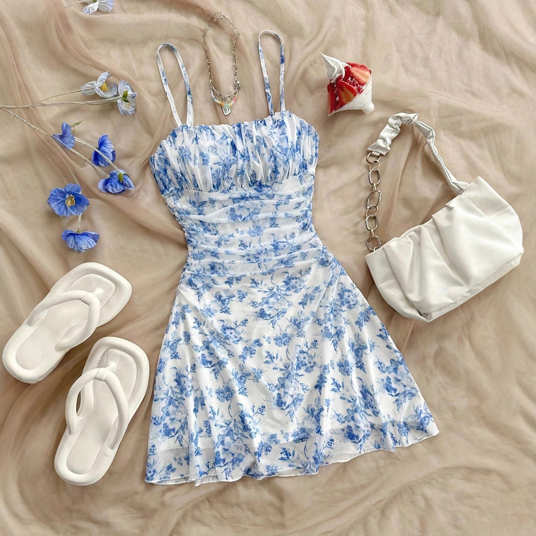 Women's summer floral dress with spaghetti straps and gathers Lune London
