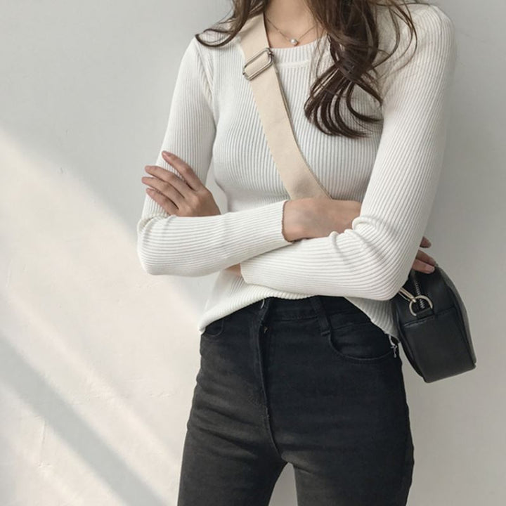 Women elegantly cut long sleeve top made of ribbed knit Lune London