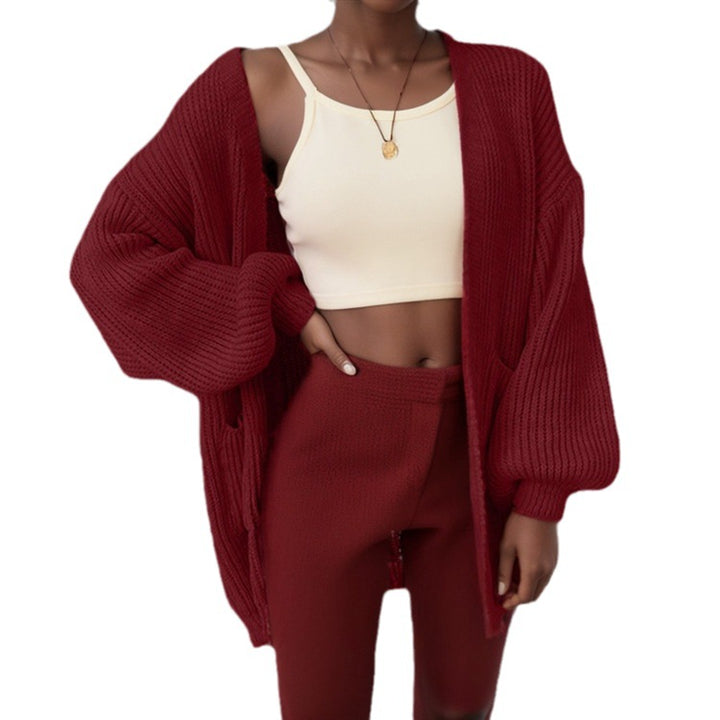 Cardigan pour femmes en tricot épais avec des manches volumineuses et des poches pratiques Chic & Stil