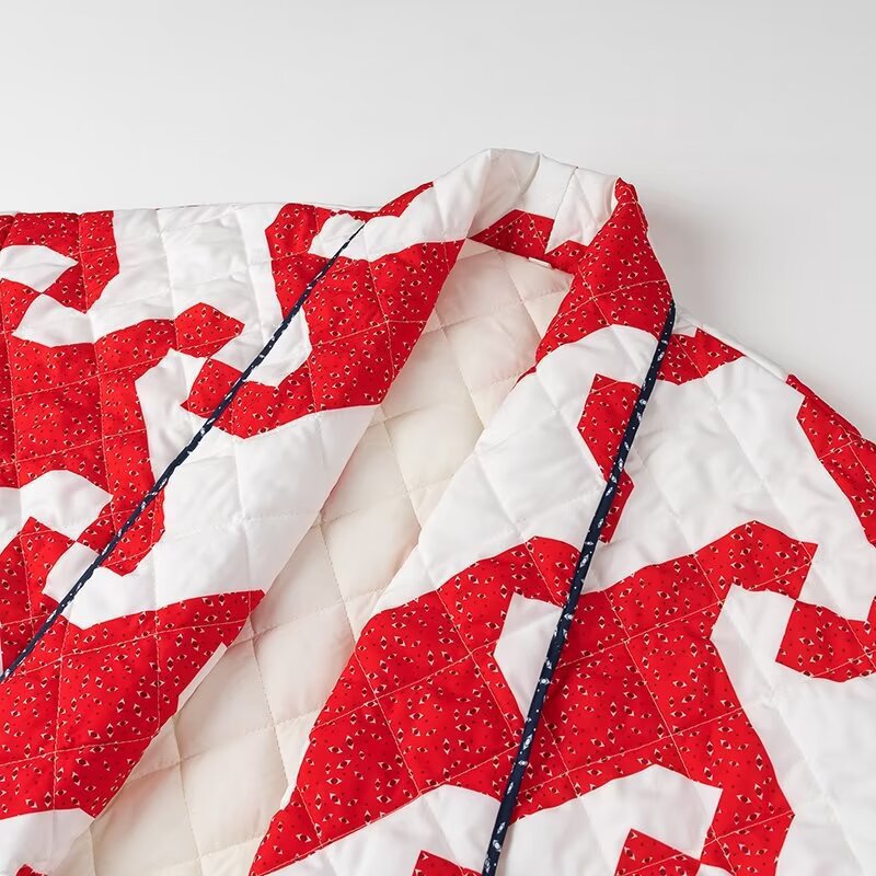 Quilted jacket for women with modern graphic design and open cut Lune London