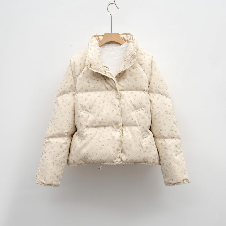 Veste matelassée volumineuse pour femmes avec un design floral et des poches pratiques Lune London