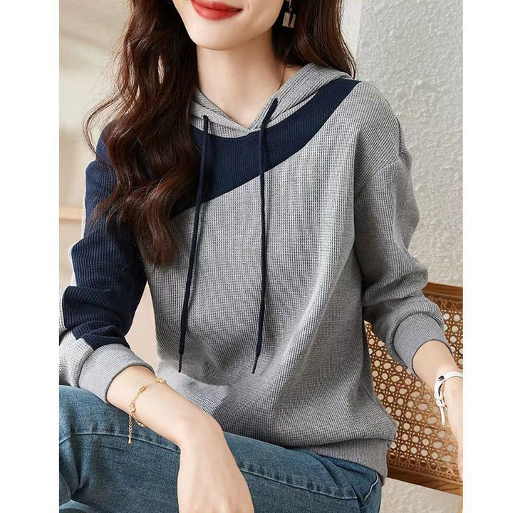 Hoodie féminin à la mode avec design texturé Chic & Stil