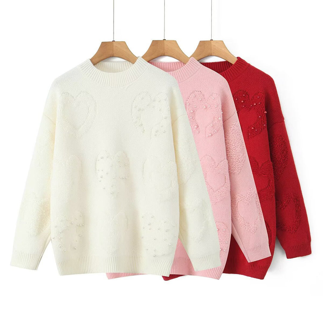 Pull en tricot confortable pour femmes avec motifs en cœur Chic & Stil