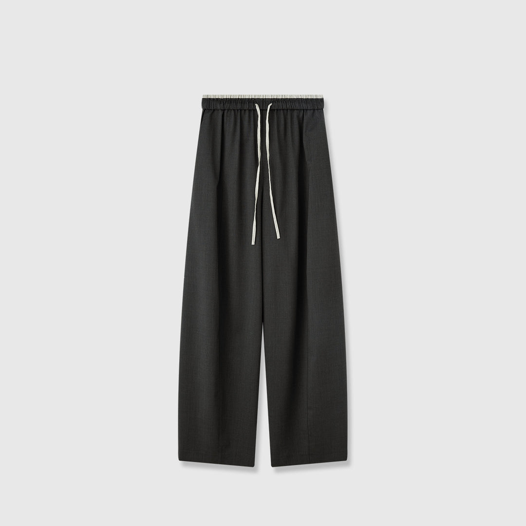 Pantalons en tissu large pour femmes avec taille élastique et poches pratiques Chic & Stil