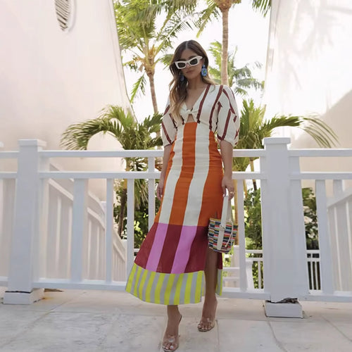 Maxi dress for women with a captivating striped pattern and a feminine waist effect Lune London