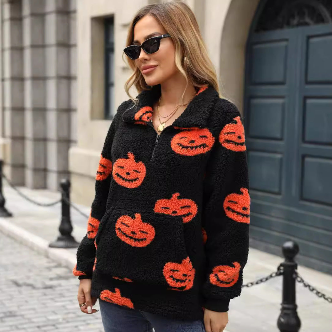 Women’s plush sweater with Halloween pattern and handy pockets Lune London