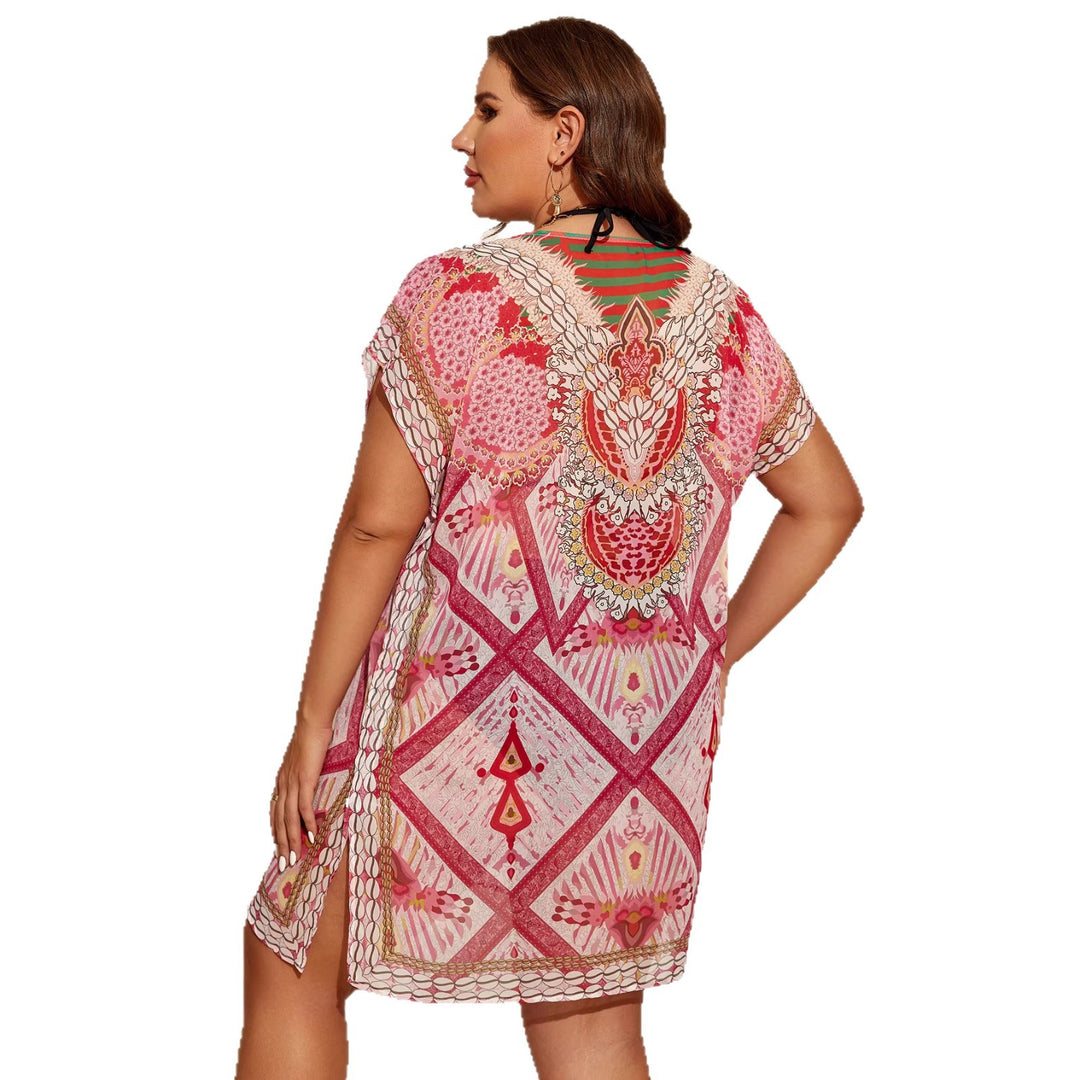 Women's beach dress with floral patterns and short cut