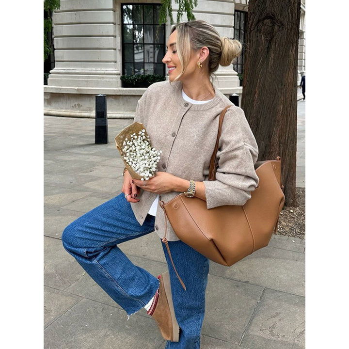 Womens knitted jacket with comfortable design featuring practical buttons Lune London