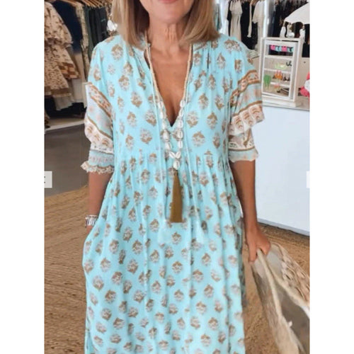 Airy tunic dress for women with floral patterns and delicate ruffle details Lune London