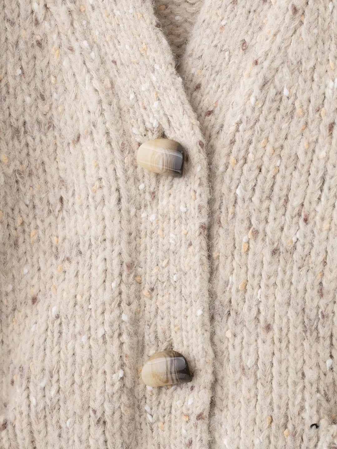 Ladies knitted vest with thick pattern and practical pockets Lune London